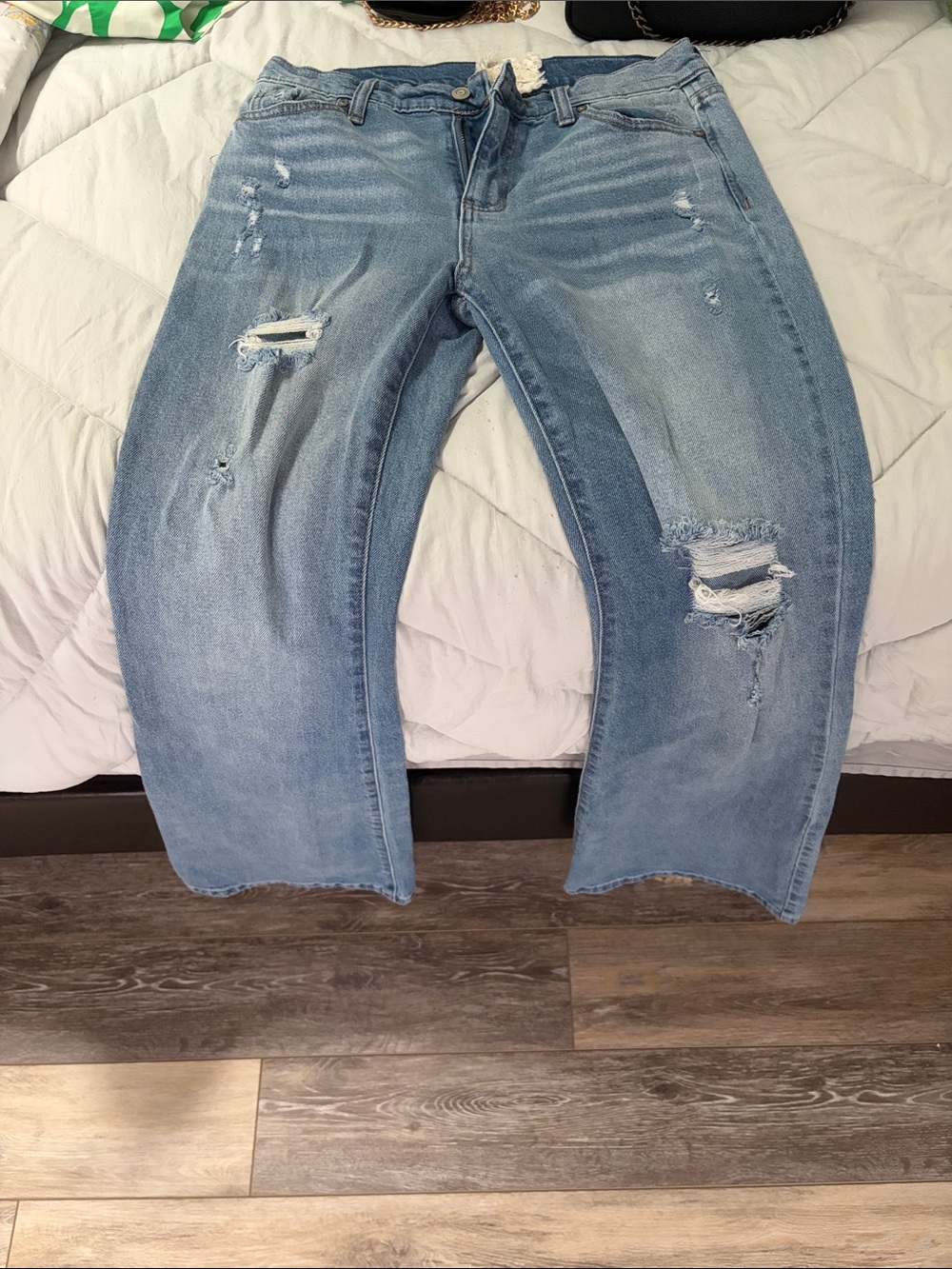 Relaxed Flare Jeans in Light Blue with Distressed Detail